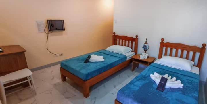 Elnora Delmar Travellers Inn Siquijor Buitenkant foto