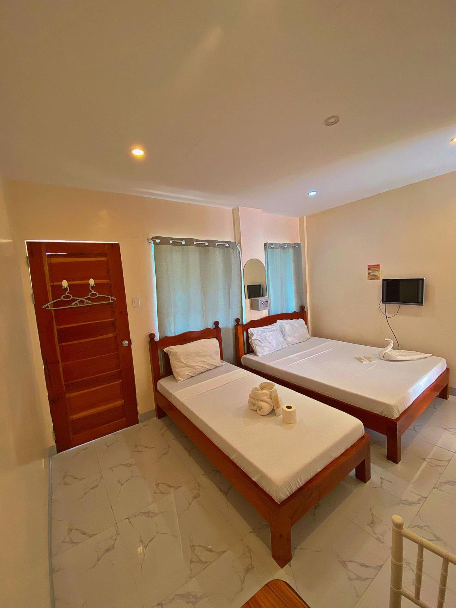 Elnora Delmar Travellers Inn Siquijor Buitenkant foto