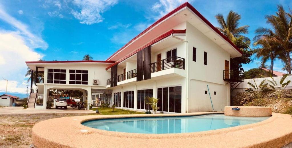 Elnora Delmar Travellers Inn Siquijor Buitenkant foto