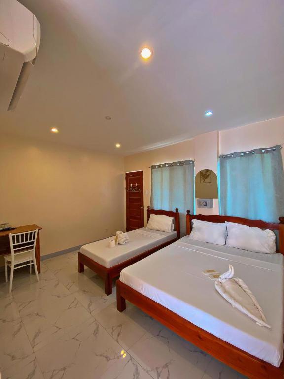 Elnora Delmar Travellers Inn Siquijor Buitenkant foto